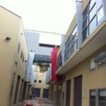 Cleaning High Windows In Industrial Complex