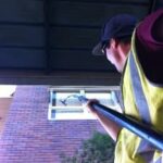 Cleaning Windows With Water Fed Pole